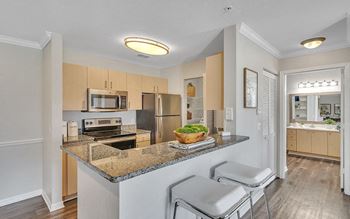 Designer cabinetry with breakfast bar